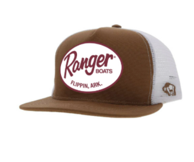 Tan Capsule Hat A brown trucker-style baseball cap with a curved brim is displayed. The front of the cap has a white oval patch. Inside the oval is the cursive word "Ranger" stacked above the smaller word "BOATS" and then "FLIPPIN, ARK." below that. The back of the cap is made of white mesh.